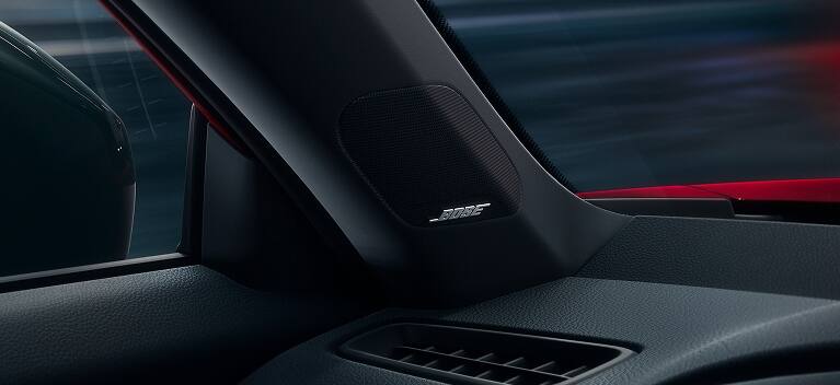 2027 Honda Civic Sedan Sport Touring Hybrid in Rallye Red Bose speaker on A-pillar interior view (Compact Sedan)